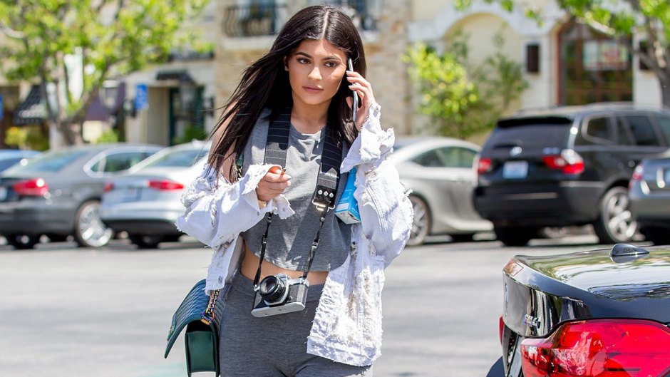 Kylie Jenner Poses in Sexy Louis Vuitton Swimsuit, Parties With