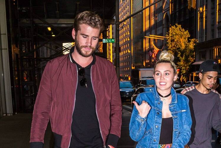 Miley cyrus liam hemsworth tattoo splash