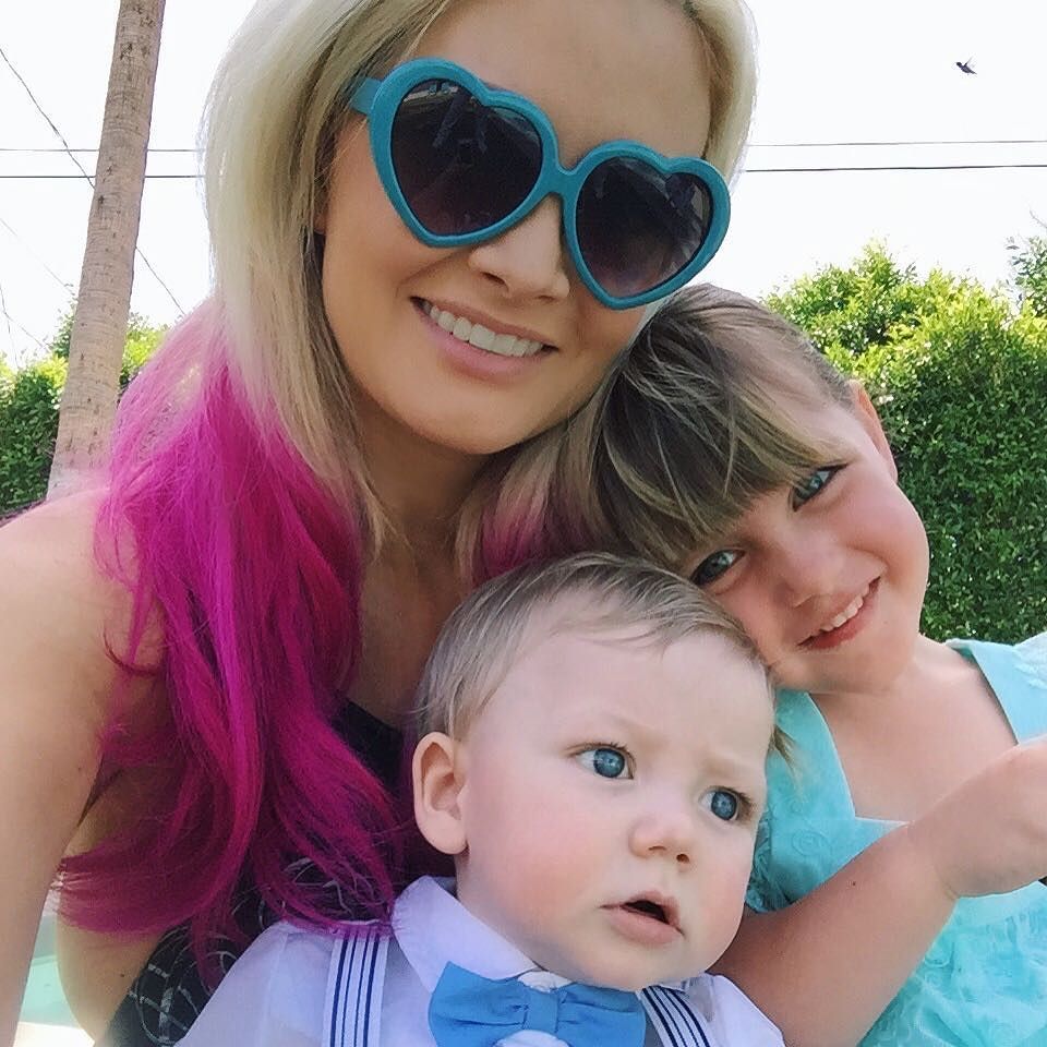 Holly Madison shows off her baby bump after Kendra Wilson declares 'war' on  her