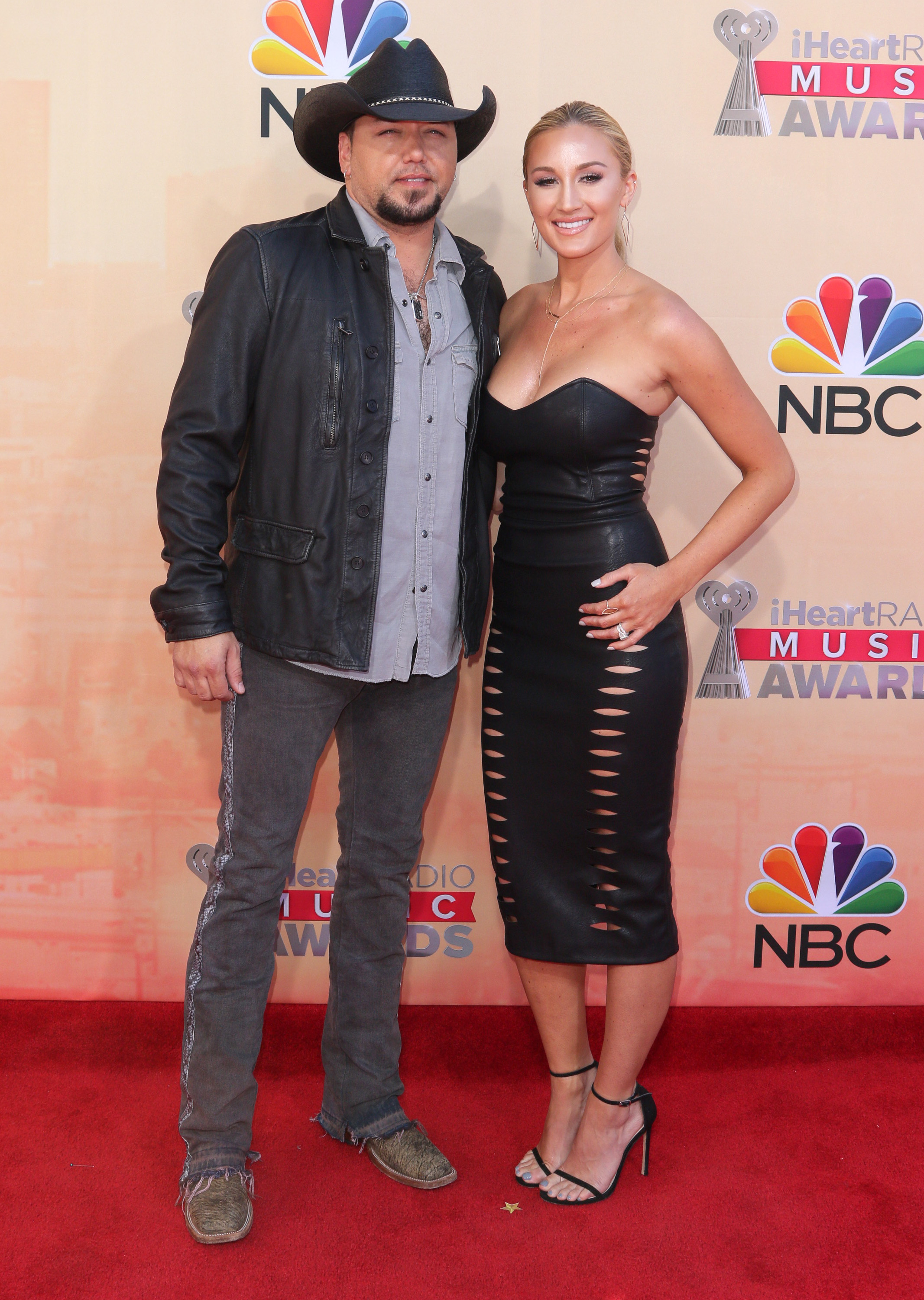 Jason Aldean and wife Brittany coordinate in black leather and