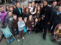 photo of the duggar family standing in the street