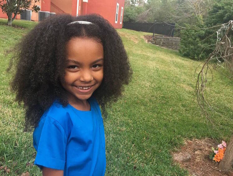 Nova DeJesus Rocking Curls Outside