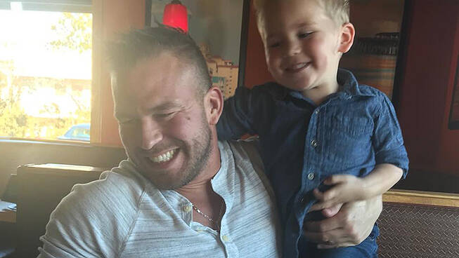 Nathan Griffith Holds Kaiser Griffith Smiles