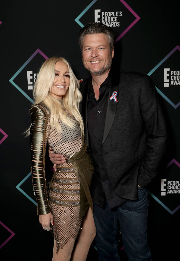 Gwen Stefani and Blake Shelton together at an event