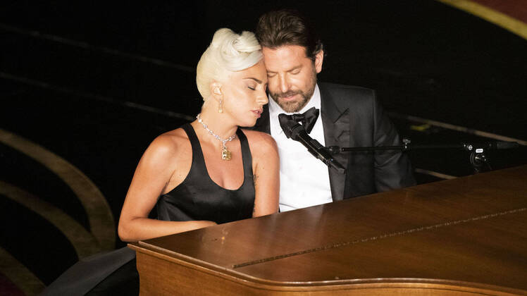 Lady Gaga Bradley Cooper orange
