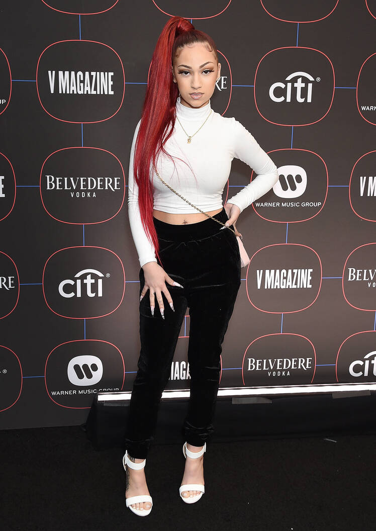 danielle bregoli wearing a white top and black pants
