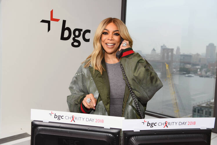 Wendy Williams on the Phone in a Gray Dress