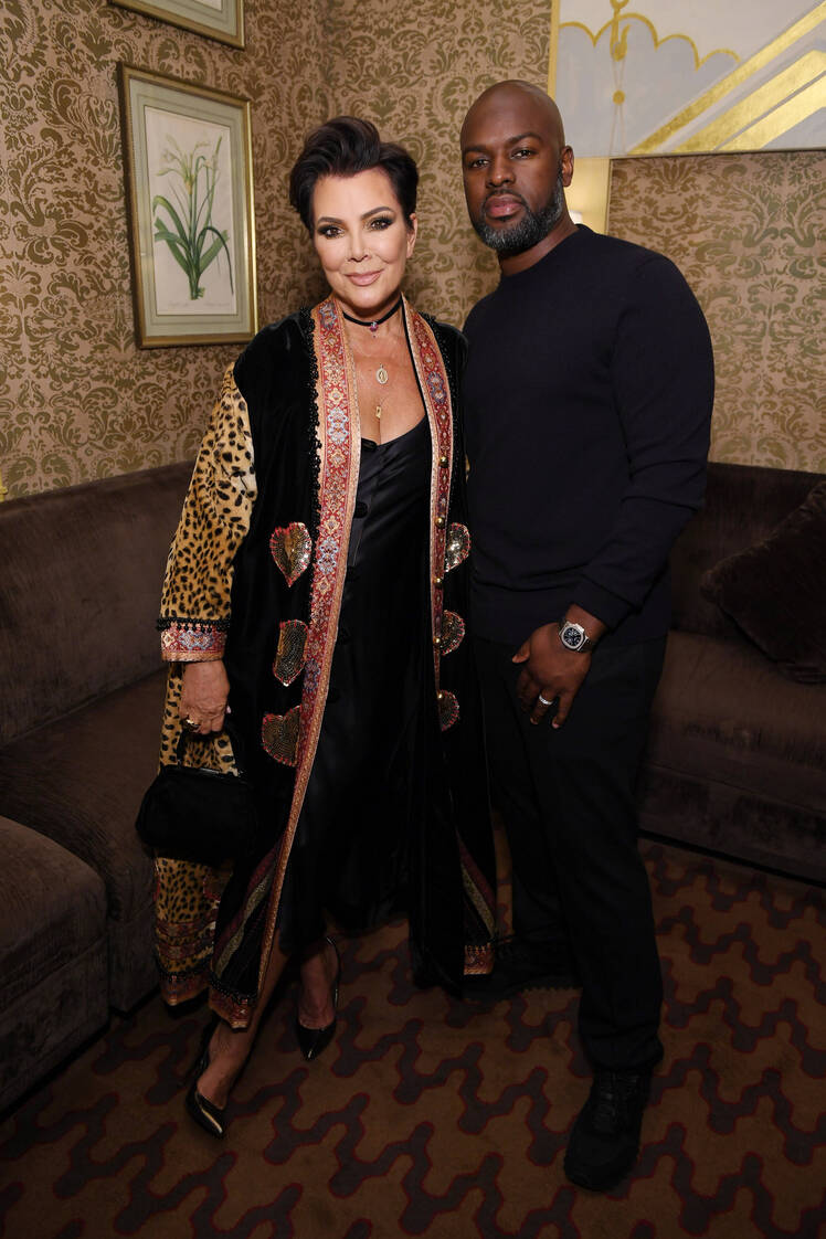 Kris Jenner Wearing a Leopard Outfit with Corey Gamble