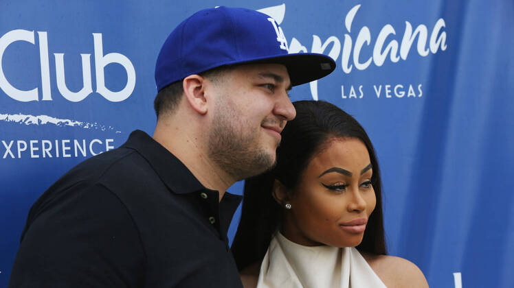 Rob Kardashian and Blac Chyna Wearing a White Shirt