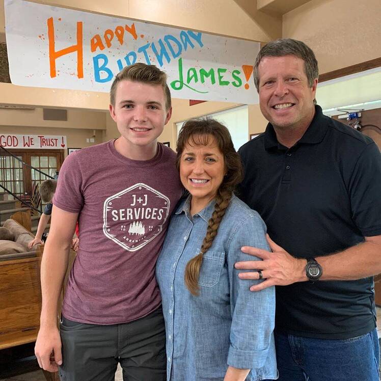 James, Michelle and Jim Bob Duggar