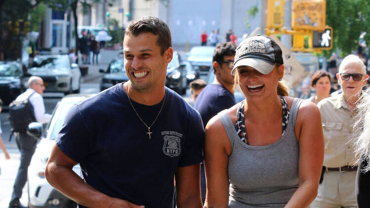 Miranda Lambert Wearing a Gray Shirt With Brendan McLoughlin
