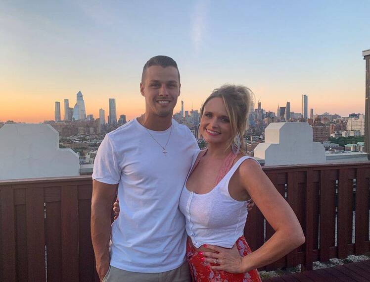 Miranda Lambert Wearing a White T-Shirt With Brendan McLoughlin