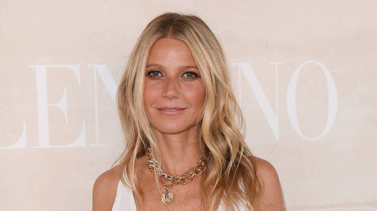 Gwyneth Paltrow Wearing a White Dress