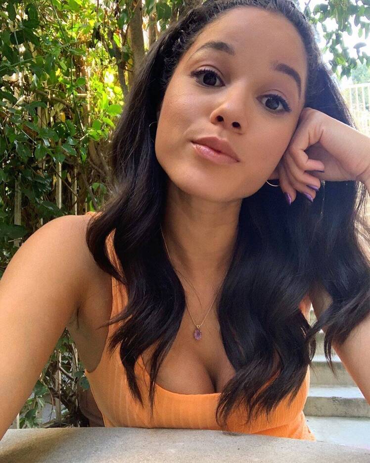 Alisha Wainwright in an Orange Top
