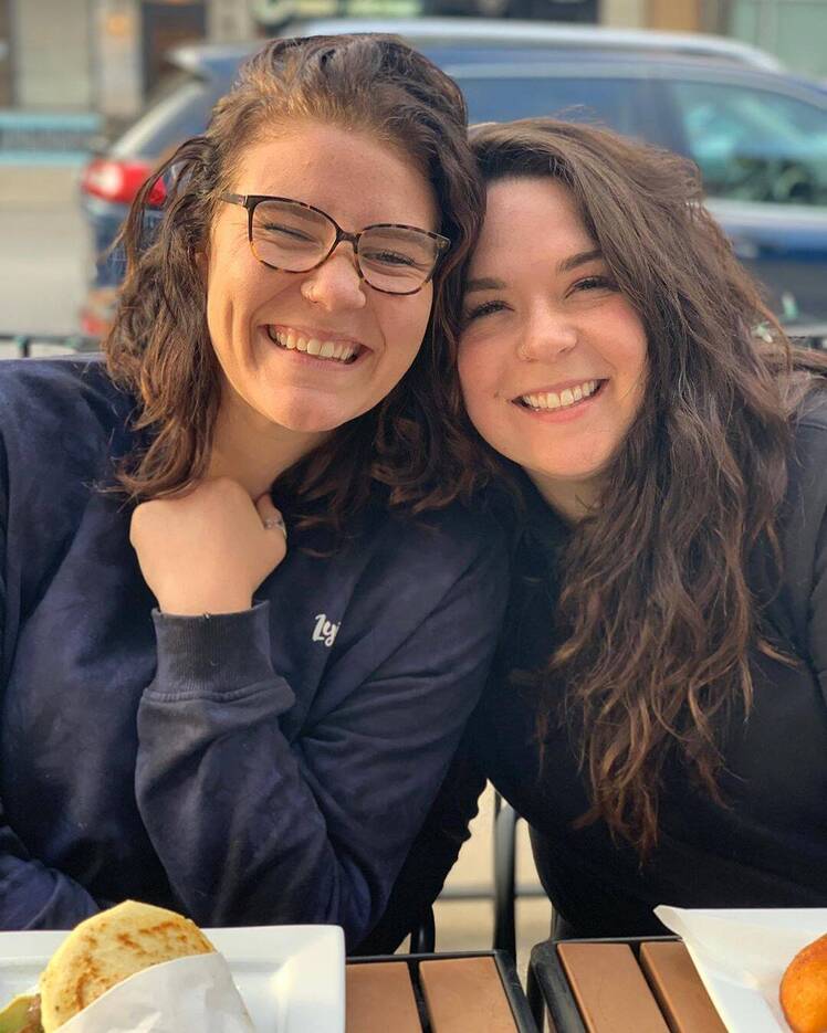 mariah brown and audrey kriss grinning at camera