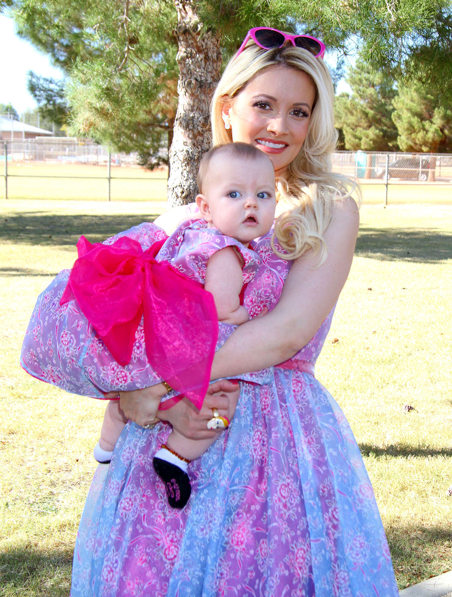 Holly Madison shows off her baby bump after Kendra Wilson declares 'war' on  her