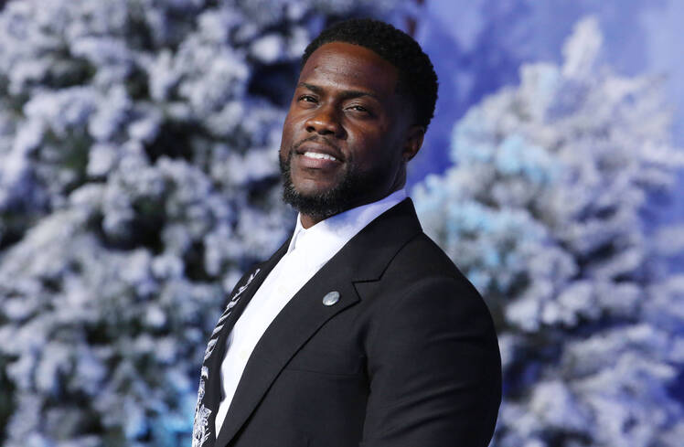 Kevin Hart Wearing a Suit With Snow in the Background