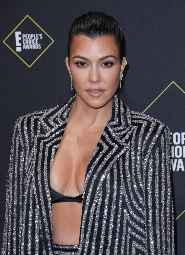 Kourtney Kardashian Claps Back at Criticism For Getting Another Dog