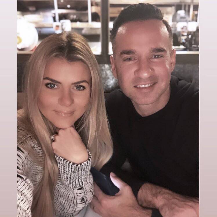 Mike Sorrentino Wearing a Black Shirt With Lauren Sorrentino