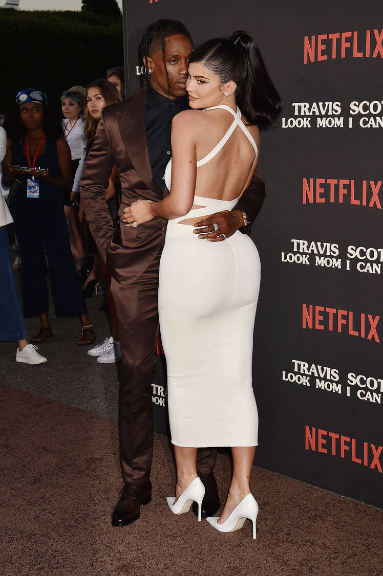 Kylie Jenner Wearing a White Dress With Travis Scott