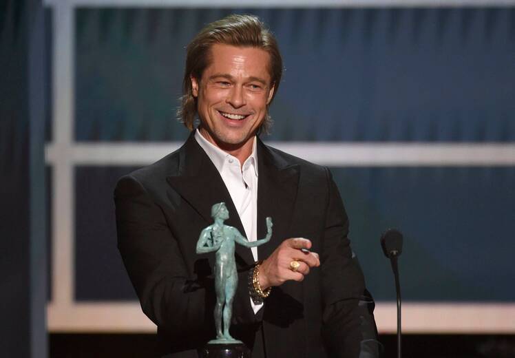 Brad Pitt With His SAG Awards on Stage