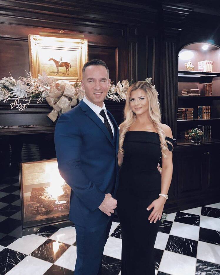 Mike Sorrentino With His Wife Lauren in a Suit