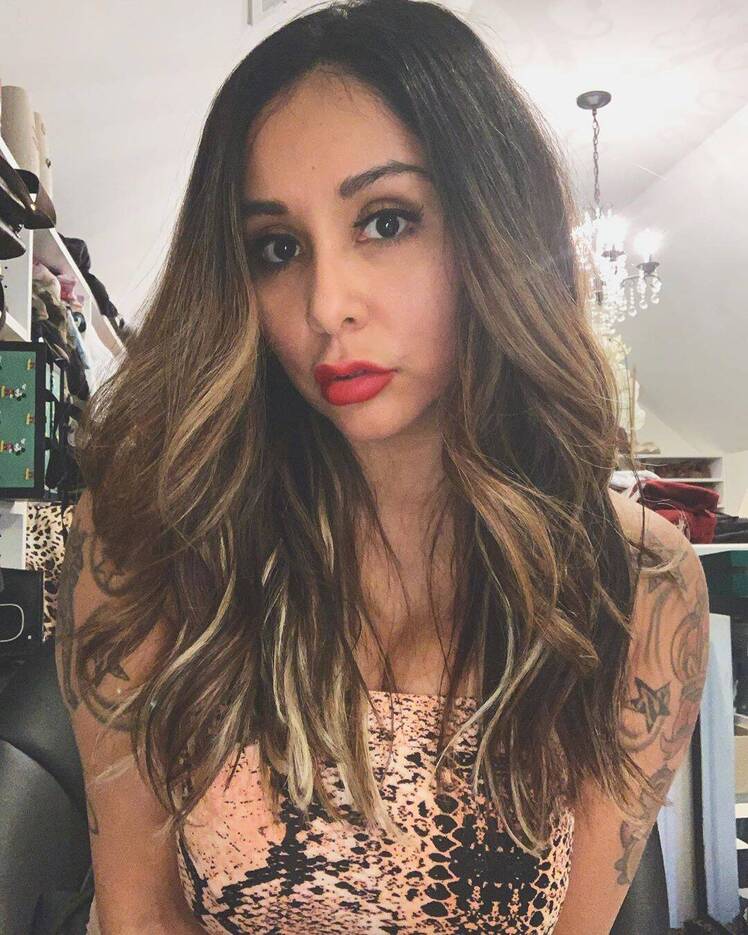 Snooki Wearing Red Lipstick Taking a Selfie