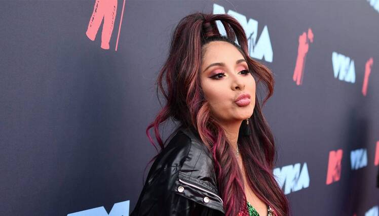 Snooki Claps Back at 'Duck Lips' Comment