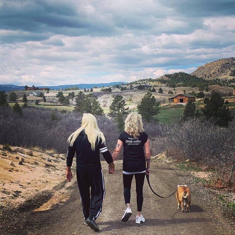 Duane Chapman and Fiance Francie Frane Walking Dog Outside
