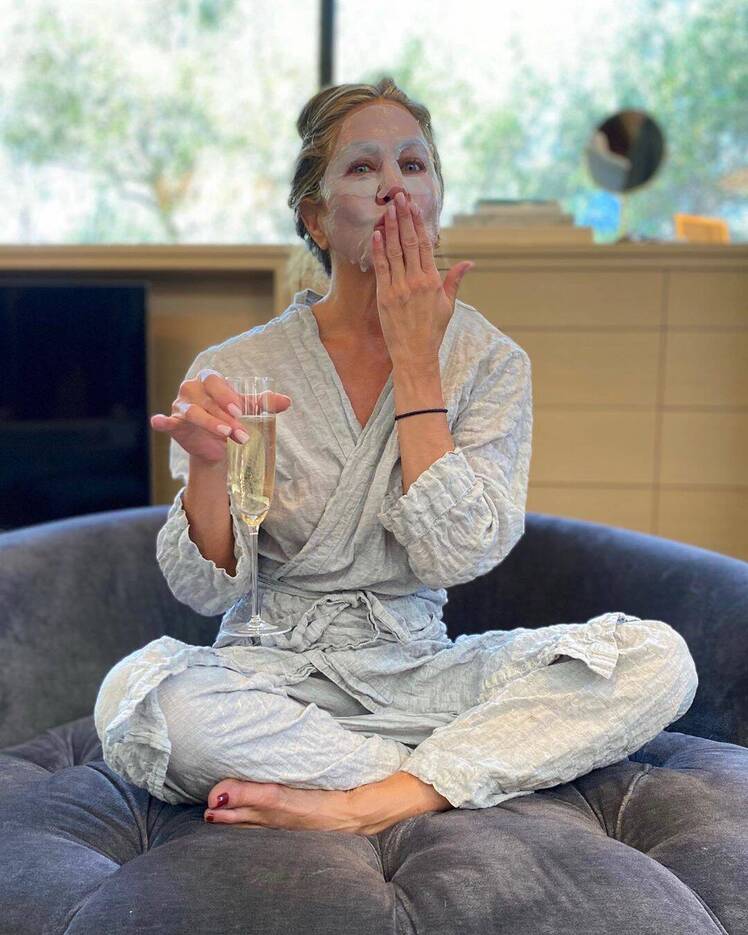 Jennifer Aniston Wears Facemask to Celebrate Emmys at Home