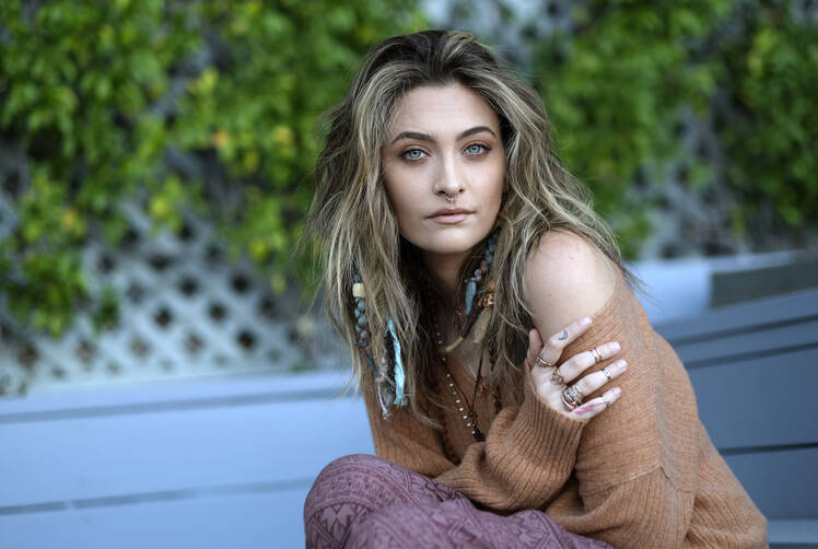 IT: Paris Jackson Gives Rare Insight Into Childhood With Dad Michael: It Wasn't All 'Glitz and Glam'