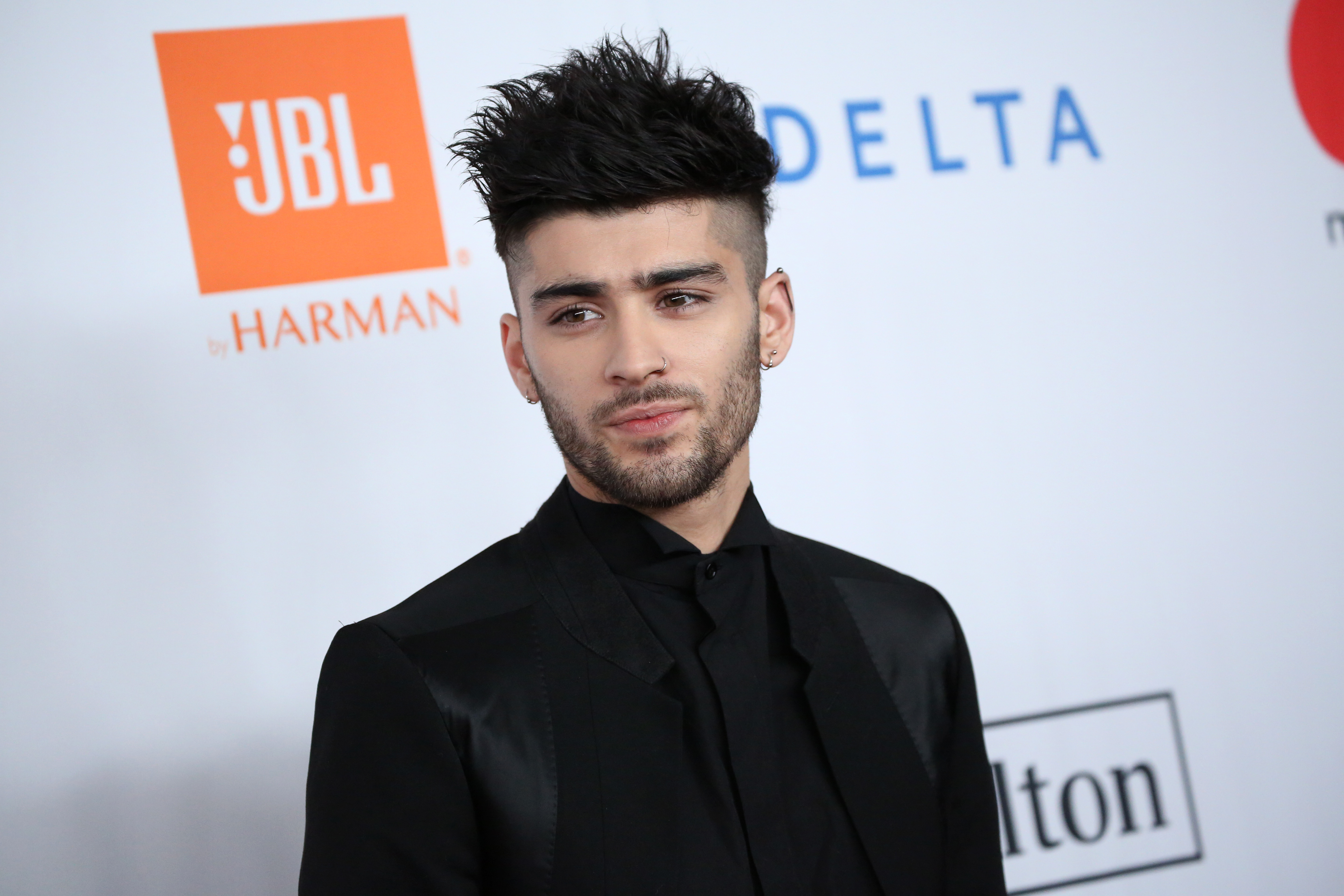 Zayn Malik Has Rare Public Outing at Paris Fashion Show — and Channels His  One Direction Era with Frosted Tips