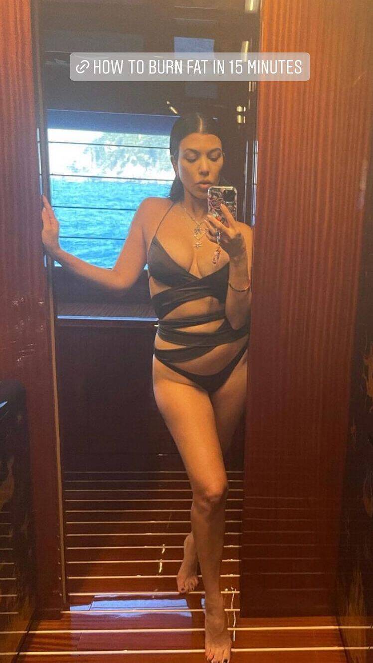 Kourtney Kardashian Rocks Sexy Cut-Out Swimsuit in Throwback Selfie From Italy Trip With Travis Barker