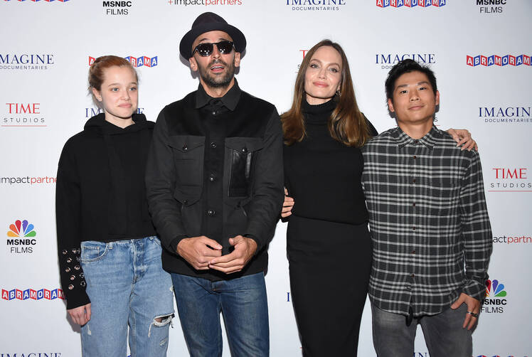 Angelina Jolie, Son Pax Depart From Heathrow Airport: Photos