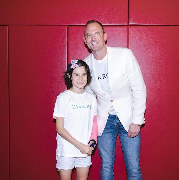 Patrick Carroll posing with Mila