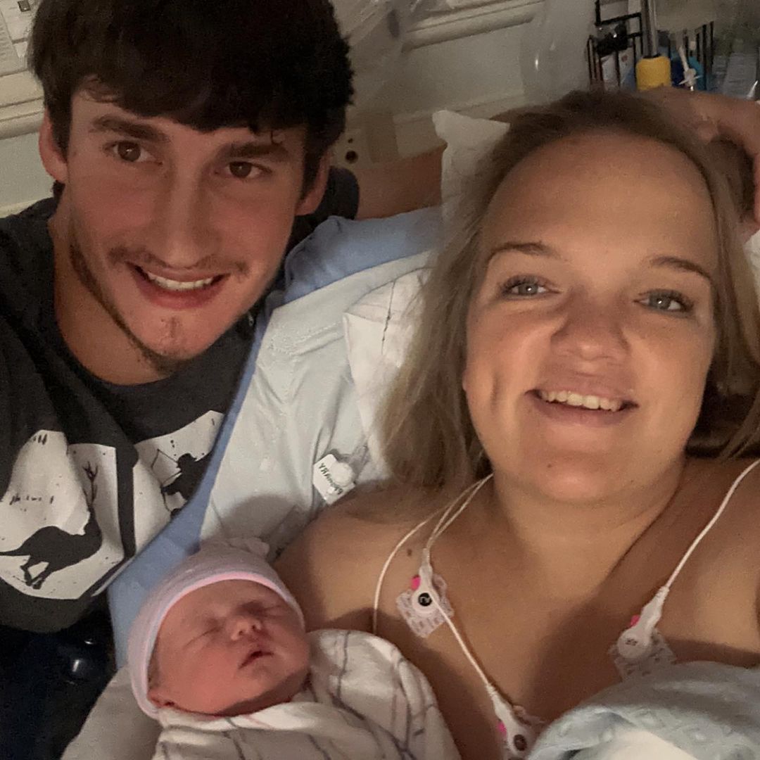 Brice Bolden and Liz Johnston with baby girl Leighton photo