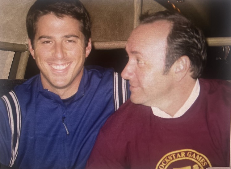 In a never-before-seen photo, Wasserman (left) grins beside actor Kevin Spacey, while wearing the same navy sports jacket he later wore while photographed with Epstein and Maxwell in front of a private jet.