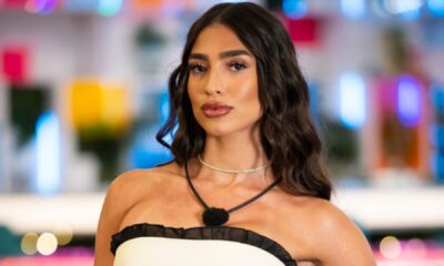Parmida Keshani poses in a white dress on 'Love Island USA'