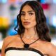 Parmida Keshani poses in a white dress on 'Love Island USA'